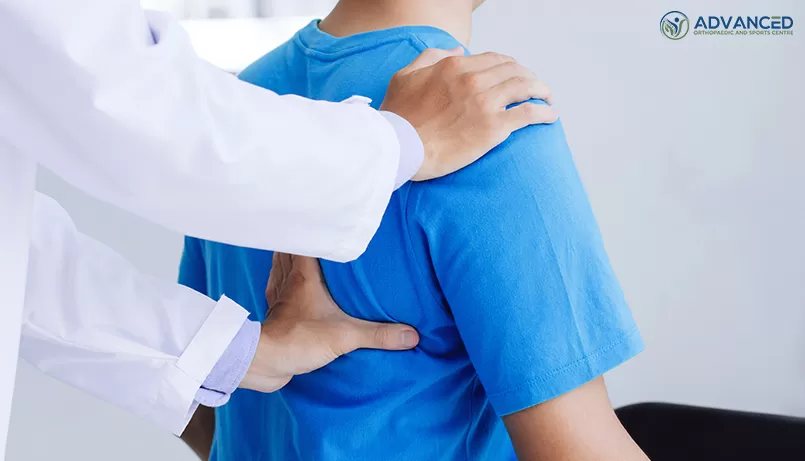 Doctor Checking a Patients Frozen Shoulder